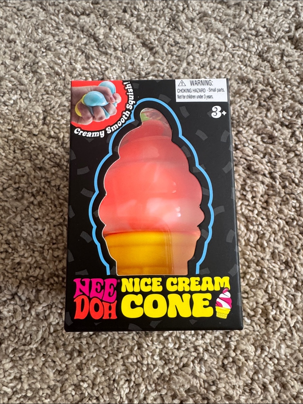NeeDoh Nice Cream Cone Squishy Toy - Orange Swirl